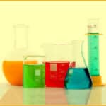 chemistry bottles with liquid inside