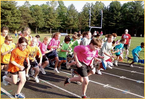 Kids run on the track