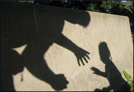 [ominous shadows of a man and a child]