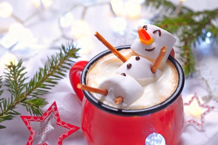 48603214 - red mug with hot chocolate with melted marshmallow snowman