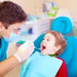 dentist with kid patient