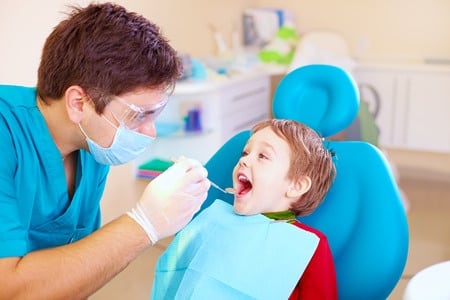 dentist with kid patient