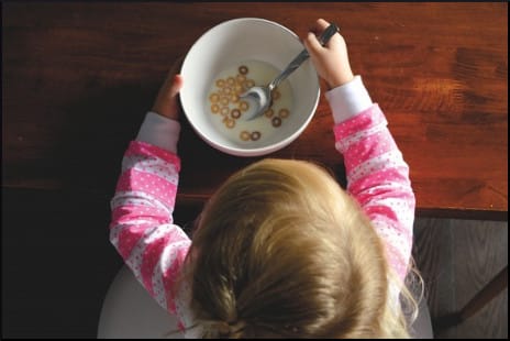 kid-eating-cereal-from-above