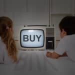 kids watching old television set
