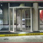 revolving-door-yellow-tape