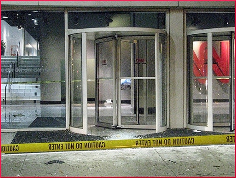 revolving-door-yellow-tape