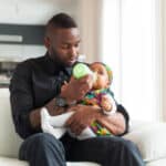 father-feeding-baby