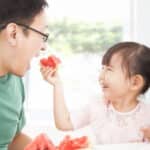 girl-feeding-dad-watermelon
