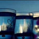 three-blue-water-glasses