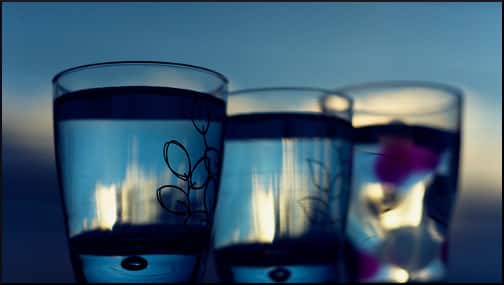 three-blue-water-glasses