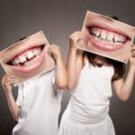 kids-holding-teeth-pics
