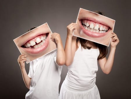 kids-holding-teeth-pics