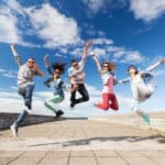 happy-teens-jumping