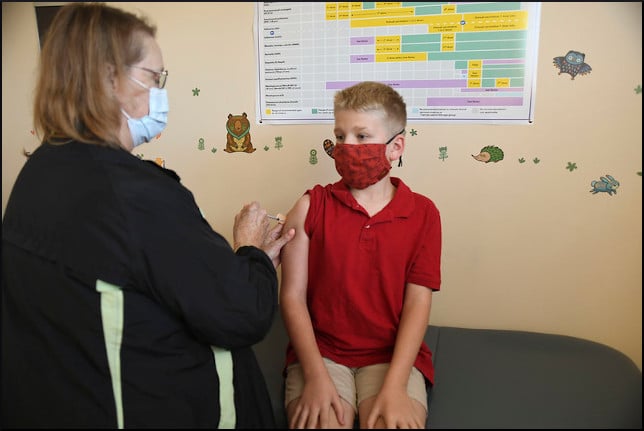 child getting vaccinated
